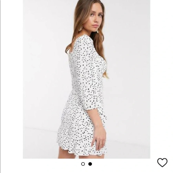 Elegant White and Black Polka Dot Mini Dress - Picture 3 of 8